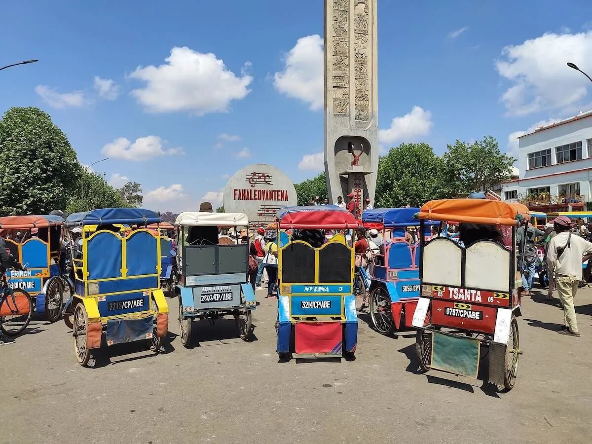 Colourful pousse-pousse rickshaws in Antsirabe