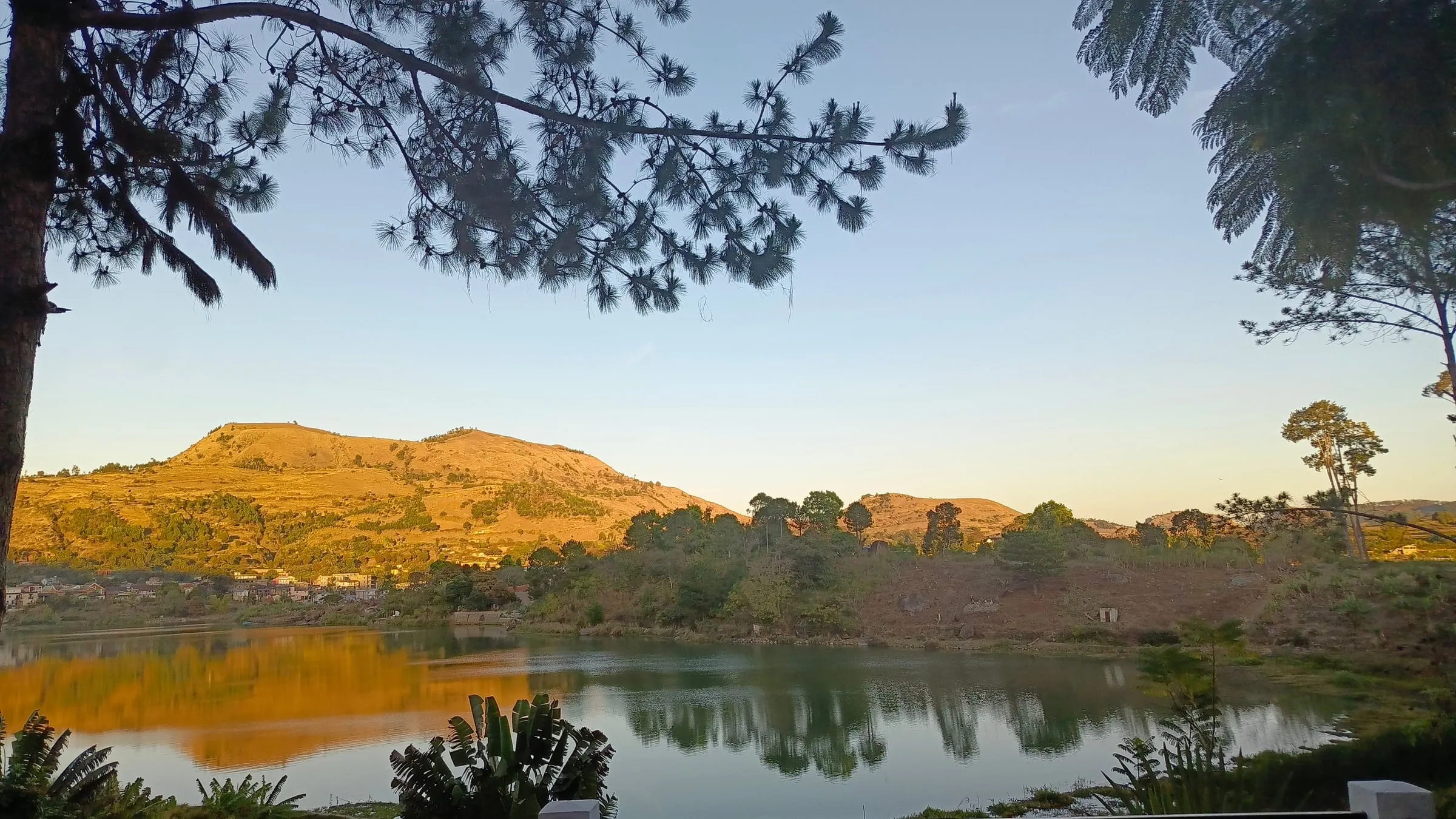 A crater lake in the morning light near Antsirabe